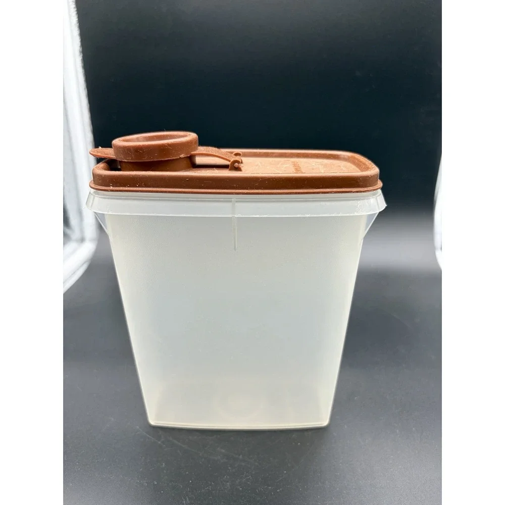 Vintage Mini Cereal Tupperware Container Bottom is 499-8 and‎ Top is 509-10.
